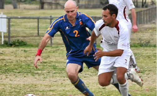 John Enosa (right) in action this season. John Enosa (right) in action this season.